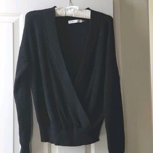 Black crossover sweater